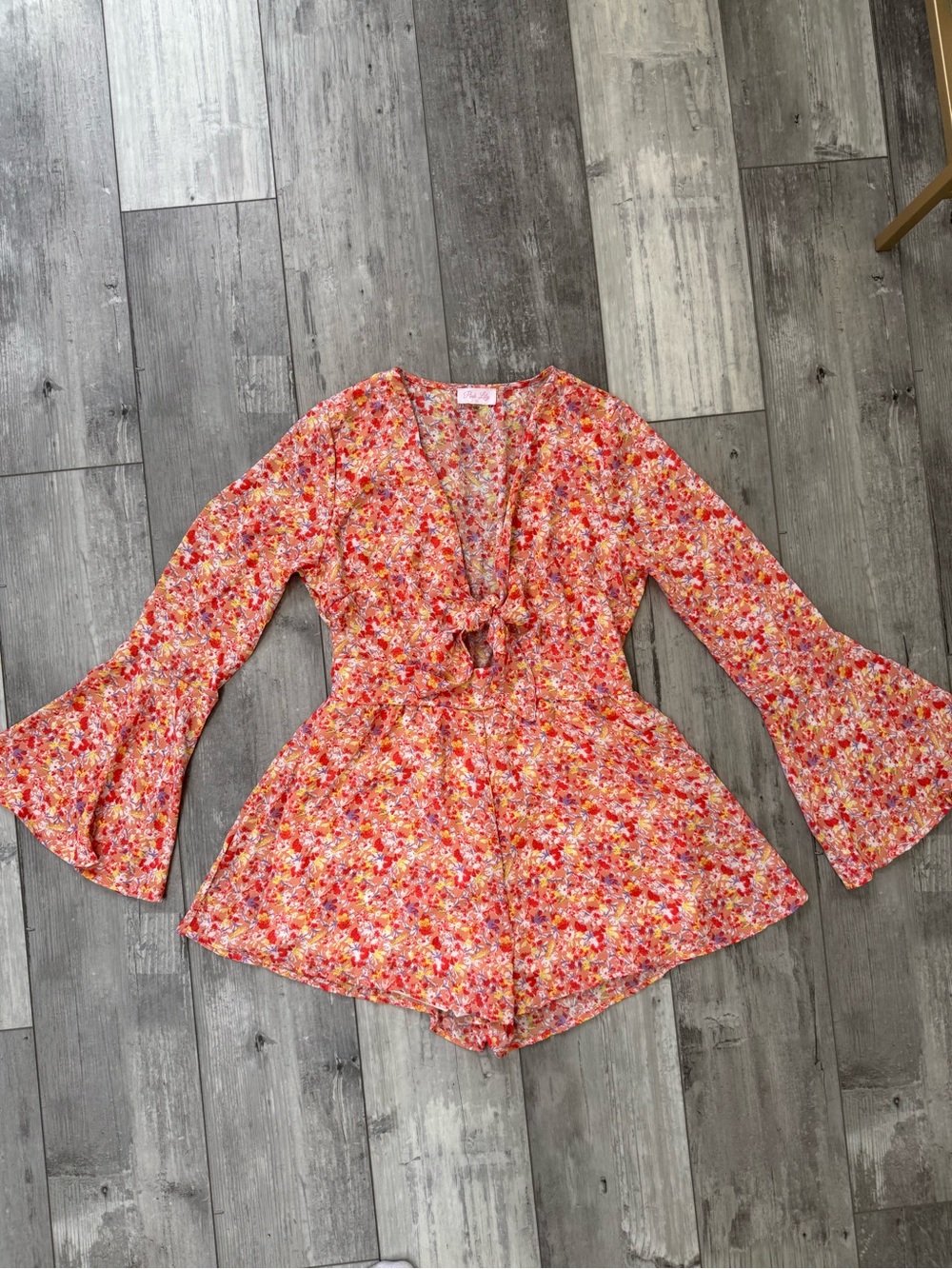 Pink Lily Glamorous Floral Tie Front Romper Small Bell Sleeve V Neck